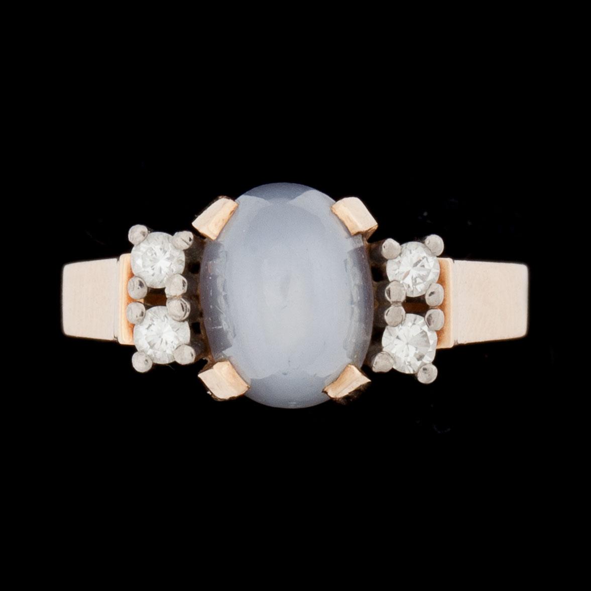 RING, 14k guld, stjärnsafir och briljantslipade diamanter ca 0.10 ct. Vikt ca 5g.