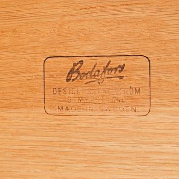 A pair of bedside tables by Sven Engström & Gunnar Myrstrand for Bodafors, third quarter of the 20th century.