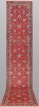 A Sarouk runner, c. 425 x 79 cm.