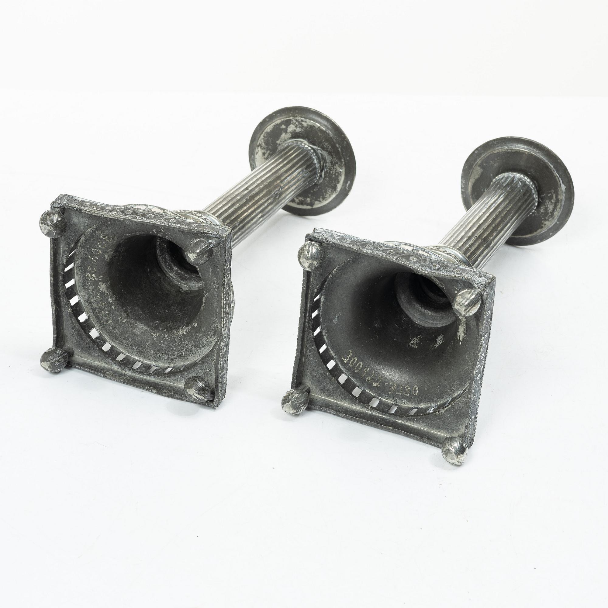 A pair of peuter candlesticks by Hans Wicksten (active between 1782-1810), Västerås.