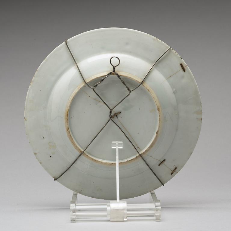 A set of four armorial dinner plates, Qing dynasty, Qianlong (1736-95).