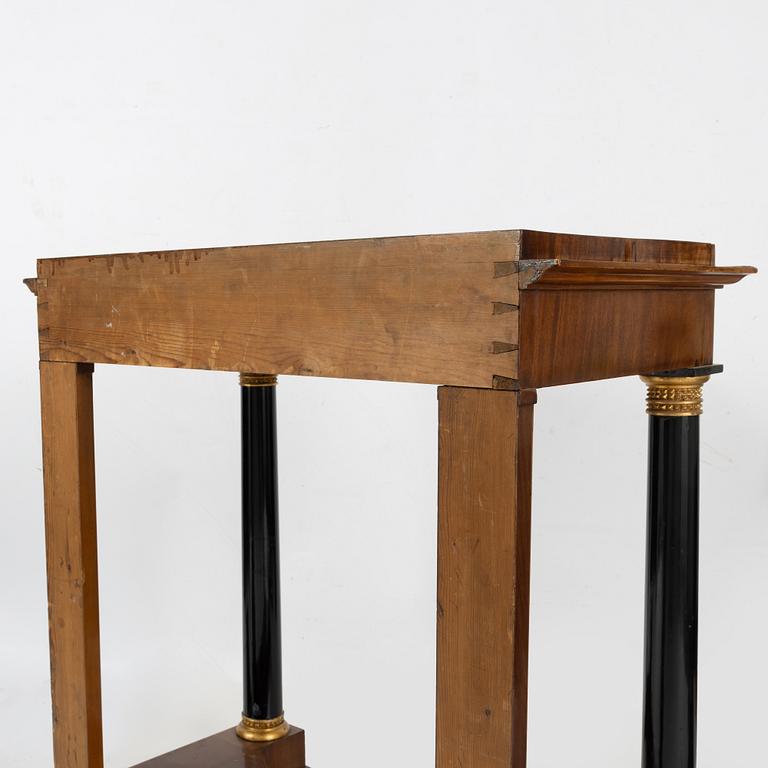 An Empire Mahogany Veneer Mirror and Console Table, first half of the 19th Century.