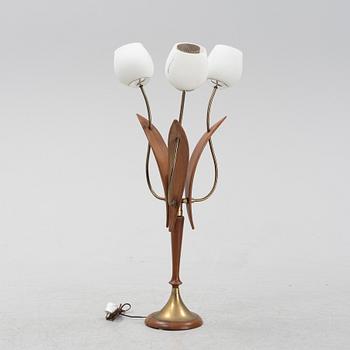 A mid century modern table lamp.