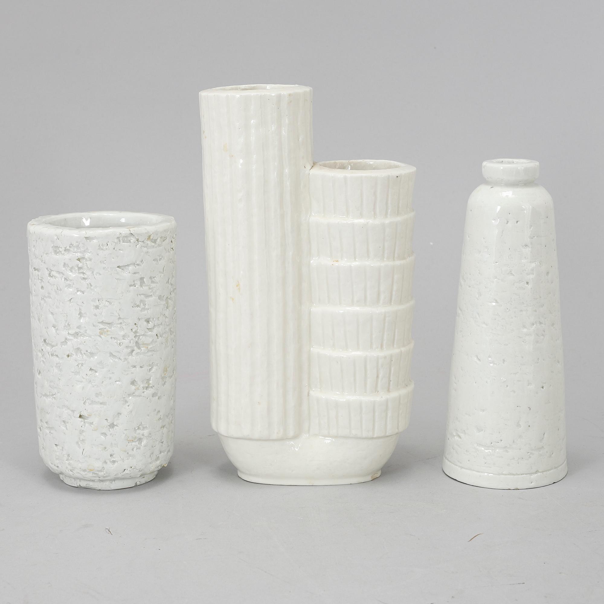 GUNNAR NYLUND, a set of three chamotte vases, Rörstrand.