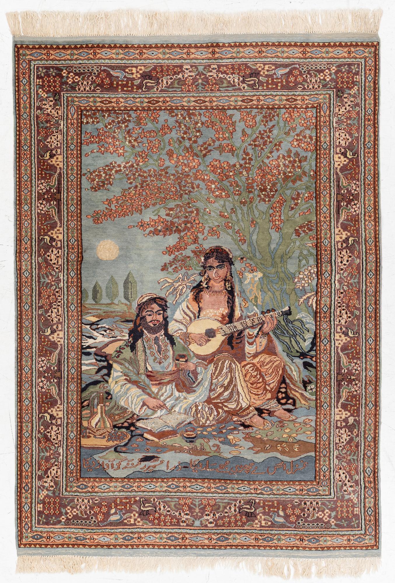 An oriental figural rug, c. 182 x 128 cm.