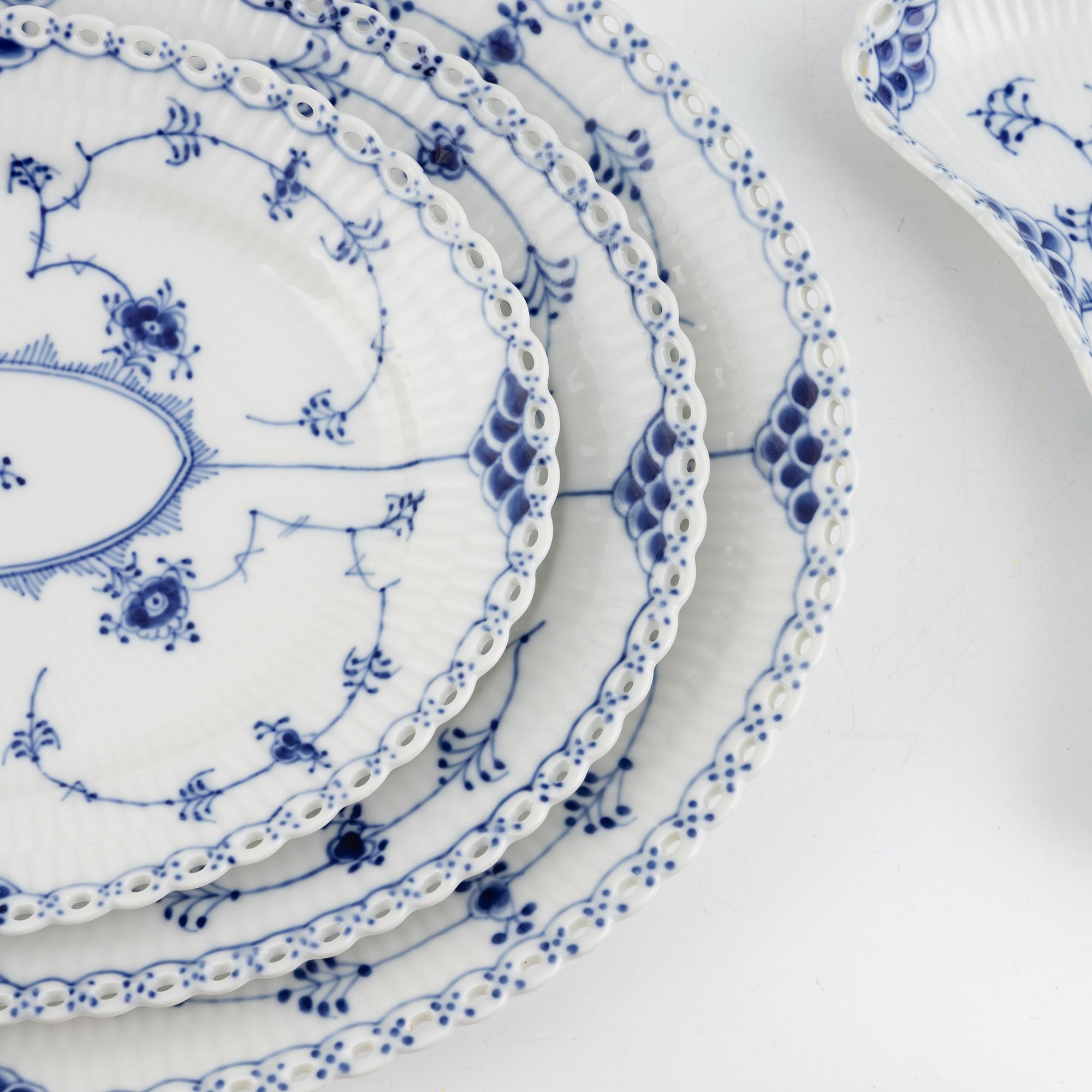 A 96-piece 'Musselmalet' porcelain dining and coffee service, Royal Copenhagen, Denmark.
