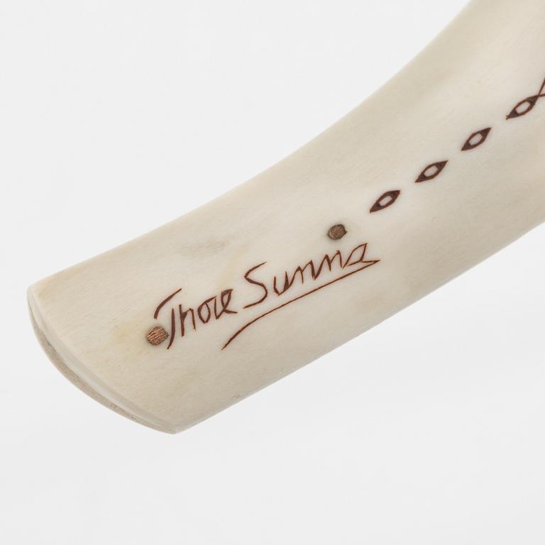 Thore Sunna, a reindeer horn knife, signed Thore Sunna.