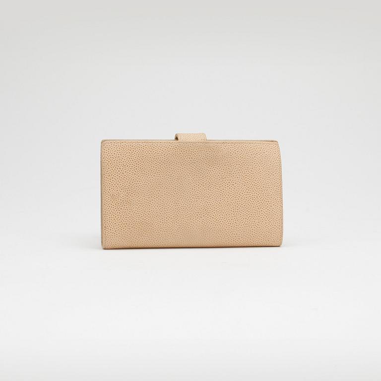 CHANEL, a beige caviar leather wallet.