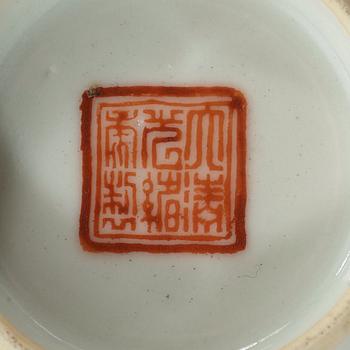 A famille rose cup, Qing dynasty with Guangxus mark.