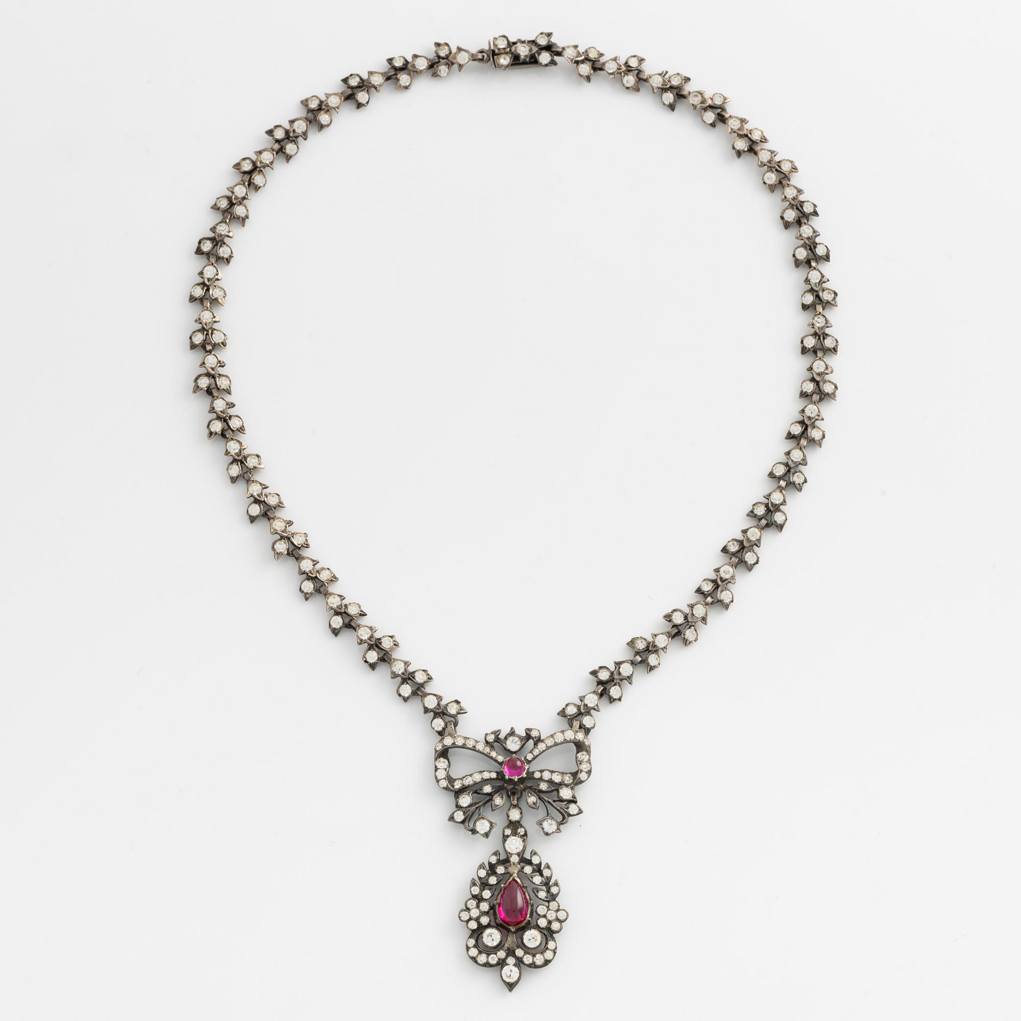 Set of necklace and earrings, silver and paste.