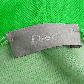 DIOR HOMME, a neon green cotton blend hoodie.