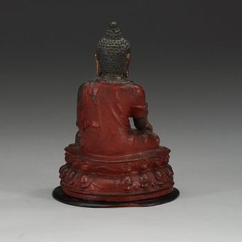A partly gilt and lacquered figure of Buddha, Qing dynasty (1644-1912).