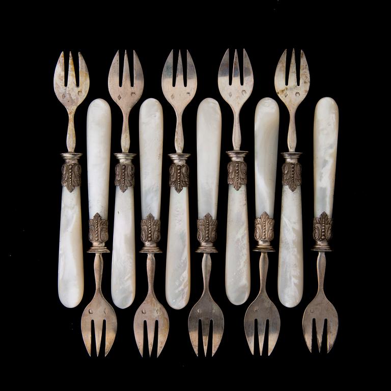A SET OF TEN 19TH CENTURY FRENCH SILVER OYSTER FORKS, marked Charles Marseille, Paris.