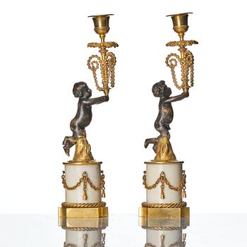 A pair of presumably German Louis XVI candlesticks, circa 1800.