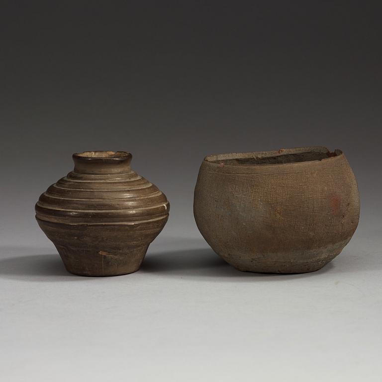 Two potted jars and a bronze belt hook, Han Dynasty (206 BC.-220 AD).