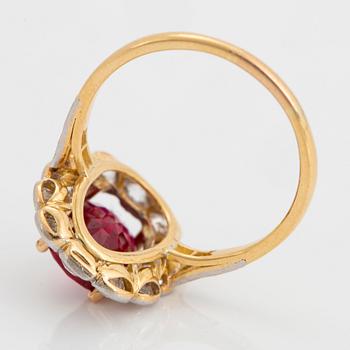 An 18K gold and platinum ring set with a faceted ruby weight ca 3.35 cts.