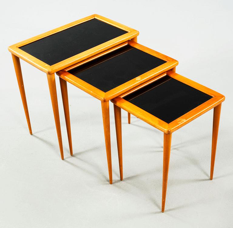 An nest of table of three pieces from the second half of the 20th century.