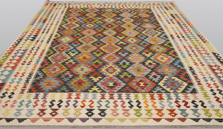 A Kilim carpet, approx. 344 x 258 cm.