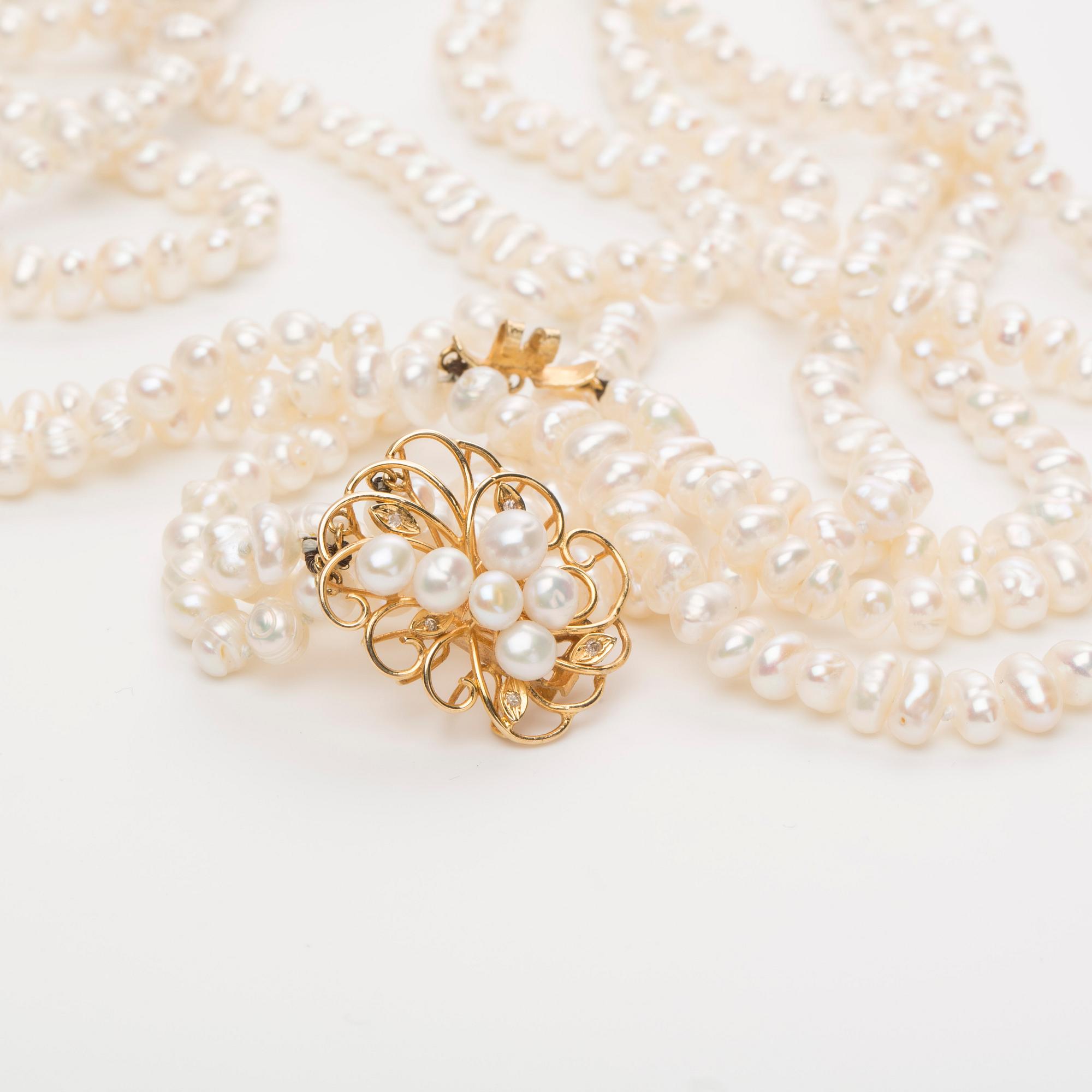 PÄRLCOLLIER, odlade sötvattenspärlor, lås i 14K guld med diamanter.