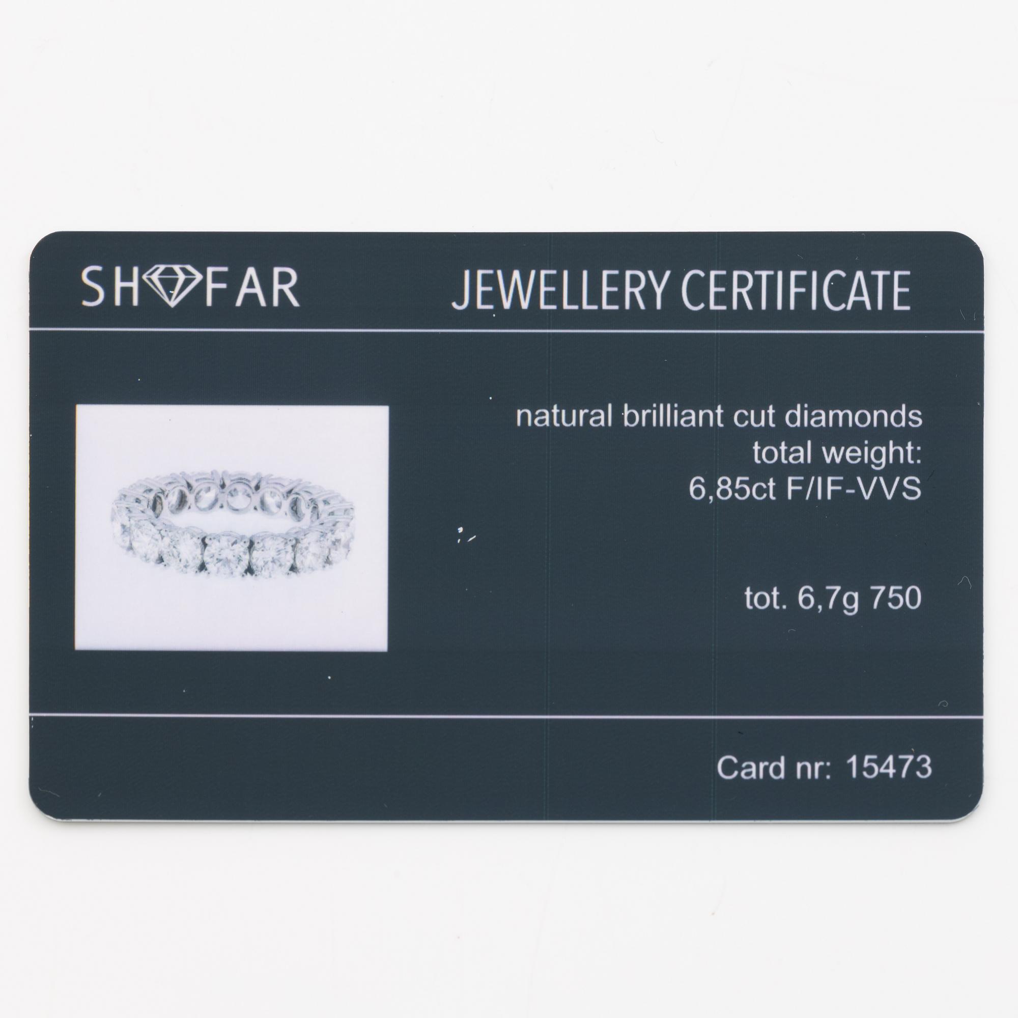 Full eternity ring 18K white gold set with brilliant-cut diamonds.