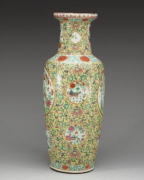 A large yellow ground famille rose vase, late Qing dynasty.