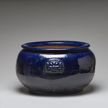 A large blue glazed flower pot/censer, presumably late Qing dynasty.