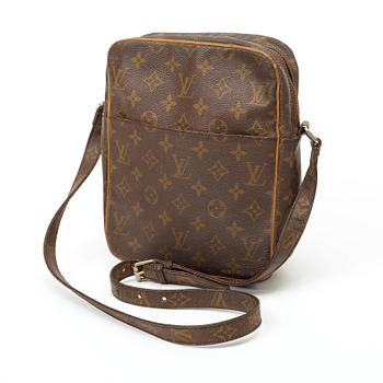 602. A 1974 monogram canvas handbag by Louis Vuitton,