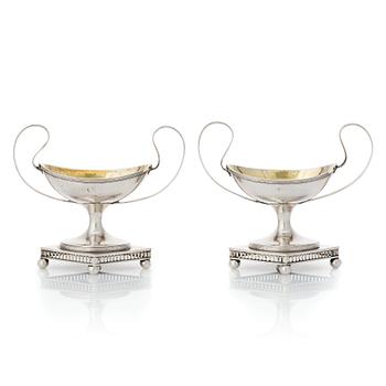 A pair of Swedish late Gustavian parcel-gilt silver salt-cellers, mark of Lars Söderström, Umeå (1815-1833).