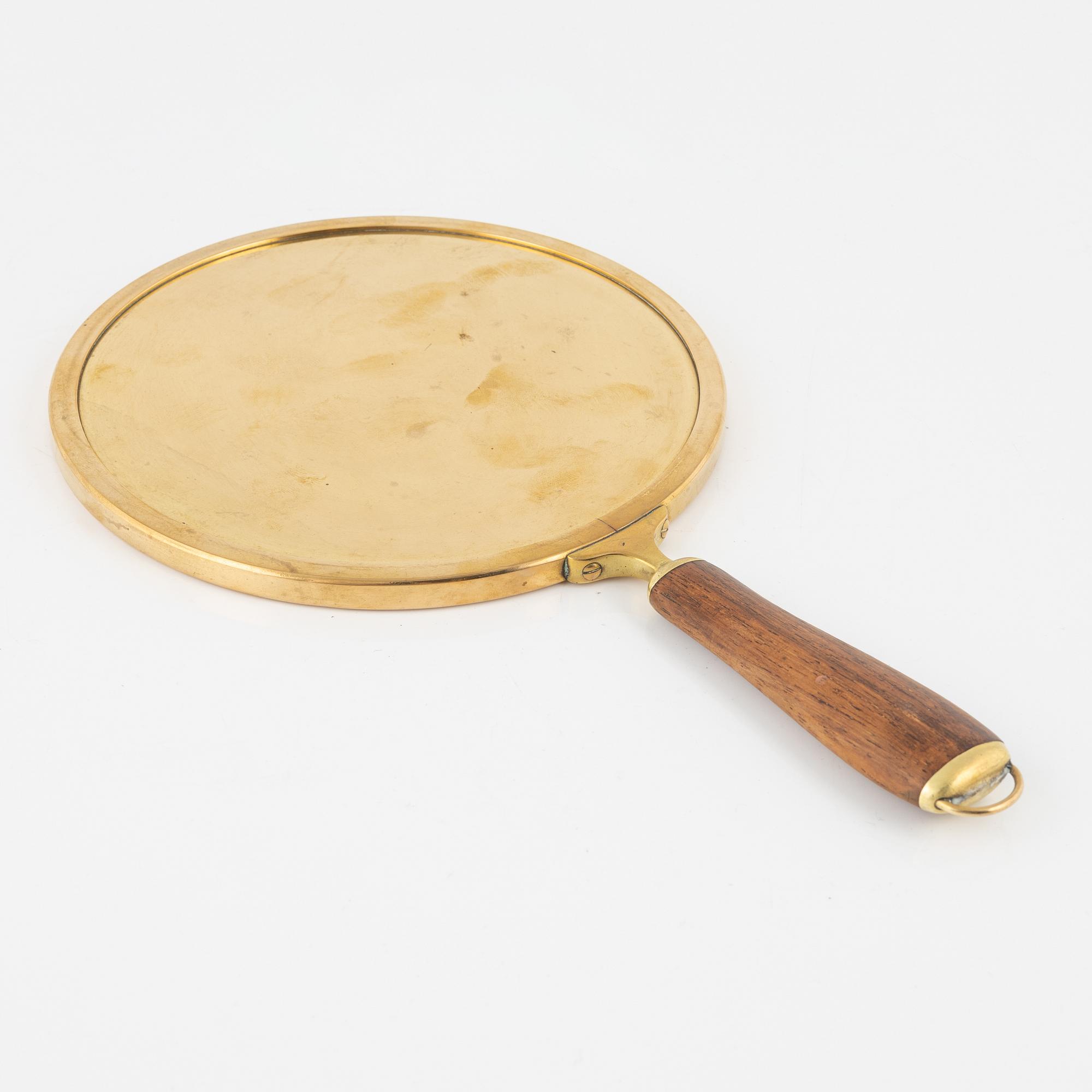 A hand mirror by Svenskt Tenn, model number H 2156, designed in 1935-36.