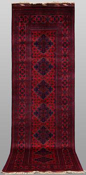 A Afghan runner carpet, 280 x 92 cm.
