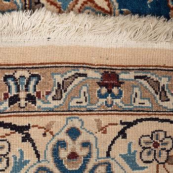 A carpet, Old Nain, part silk, ca 285 x 198 cm.