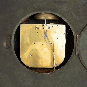 A Gustavian pendulum wall clock.