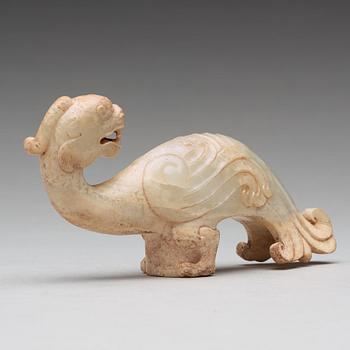 A Chinese archastic sculptured cane handle.