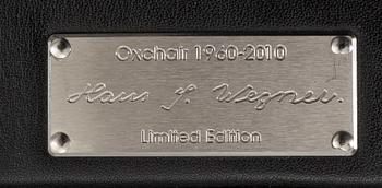 HANS J WEGNER, "Ox chair" lounge chair and stool.