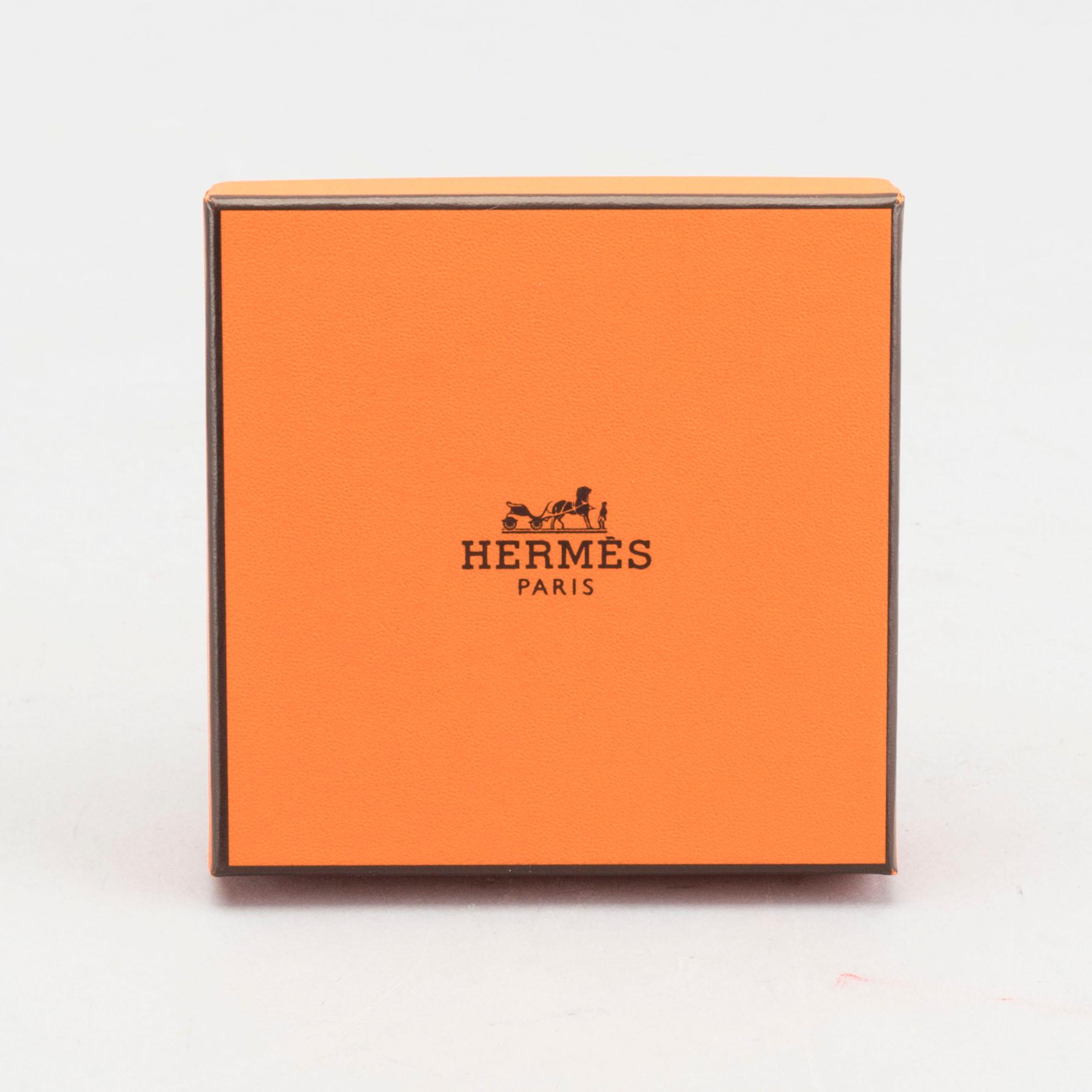 A Hermès "Clic-H" bracelet.