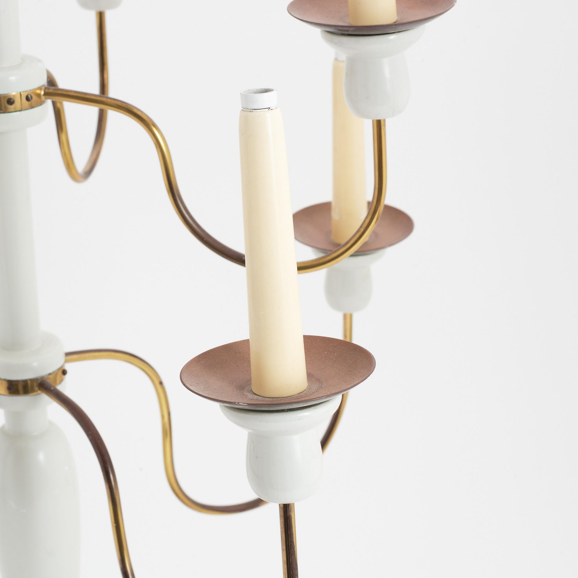 A painted wood and brass model 2586 candelabra by Josef Frank for Firma Svenskt Tenn.