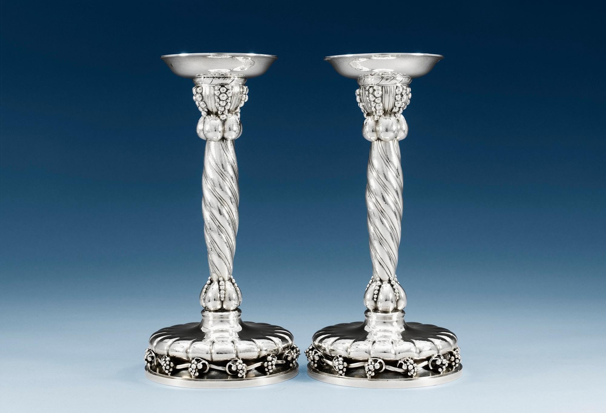 A PAIR OF GEORG JENSEN sterling candlesticks, Copenhagen 1945-77, design nr 264, Swedish import marks.