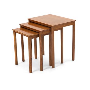 211. A walnut nesting table, Sweden, 1940-50s.