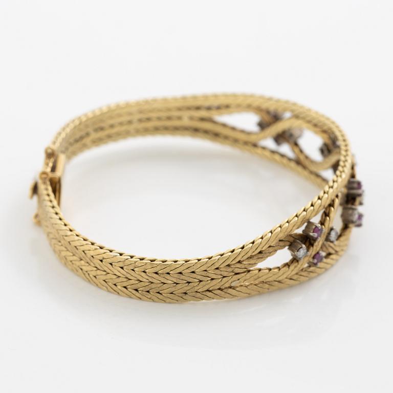Bracelet 18K gold with diamonds and rubies.