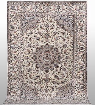 A carpet, Kashan, ca 298 x 198 cm.