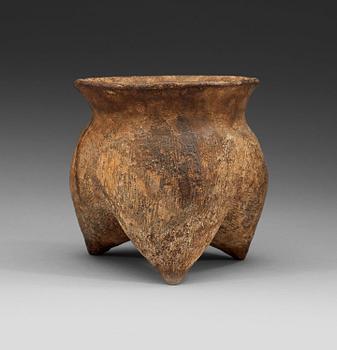 71. A grey earthenware 'li' tripod, Neolithic, circa 1500 BC.