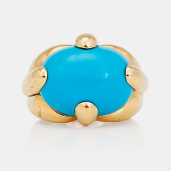 1073. A cabochon-cut turquoise ring.