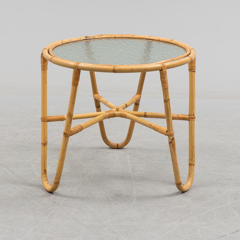 A second half of the 20th century sofa, table and armchairs.