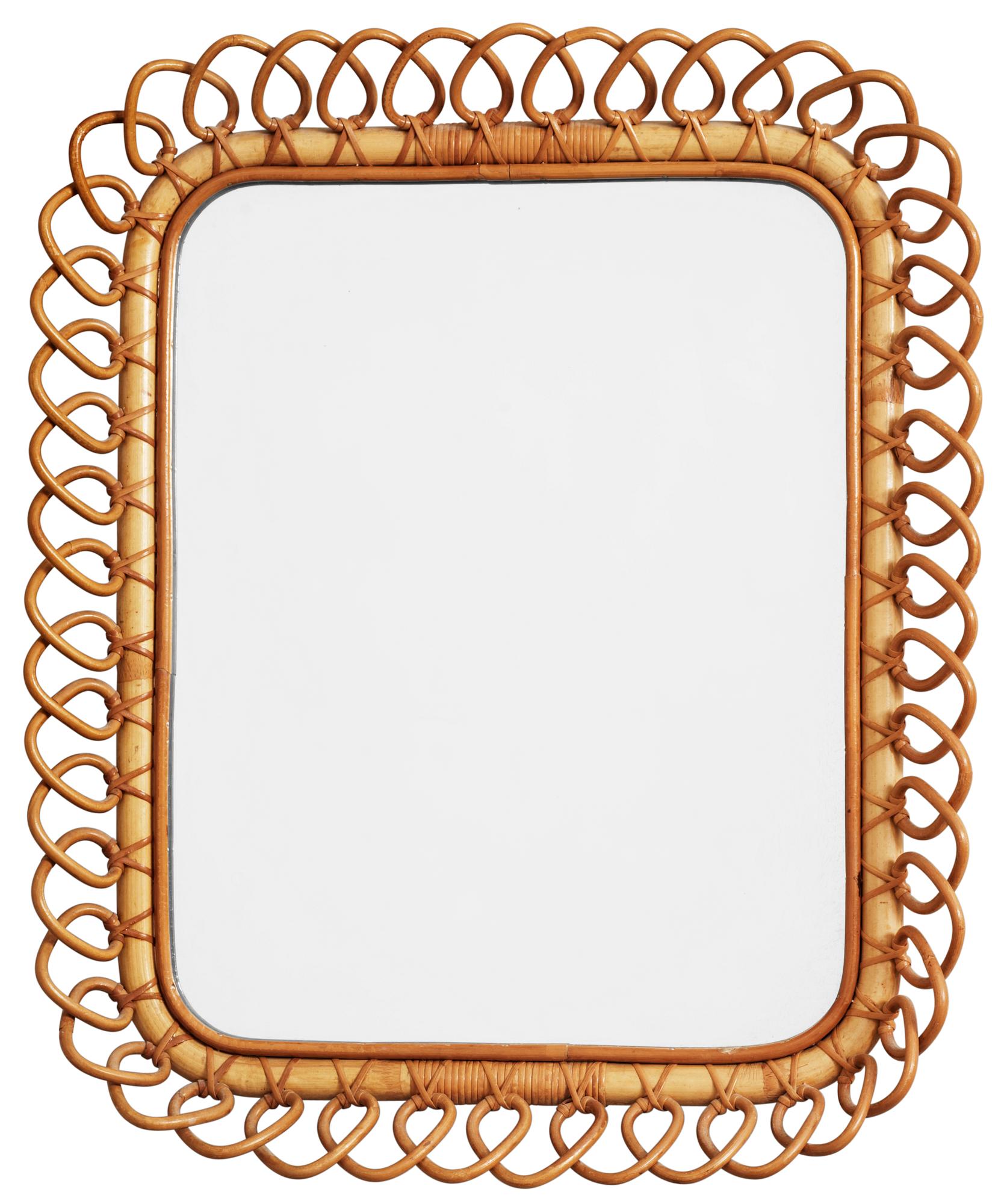 A Josef Frank rattan framed wall mirror by Svenskt Tenn.