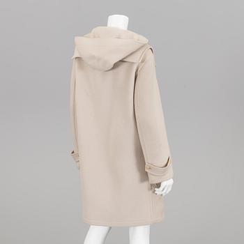 A coat by Hermès, in size 38(FR).