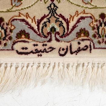 An Isfahan part silk rug, c. 161 x 110 cm.