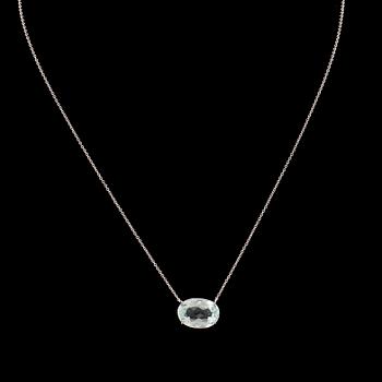 An 18K white gold necklace with an oval faceted aquamarine.