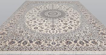 A Nain part silk carpet, 408 x 308 cm.