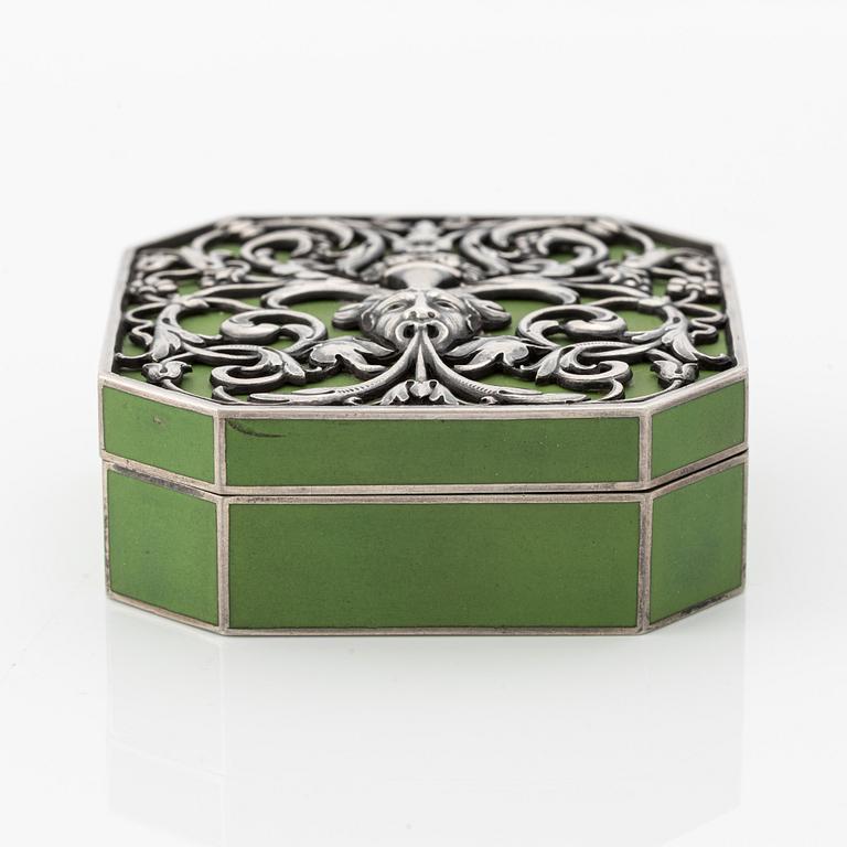 A rare silver and opaque green enamel pill box, Moscow 1912-1917.