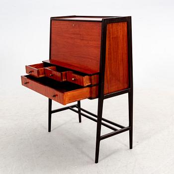 A 1950s mahogany writing desk.